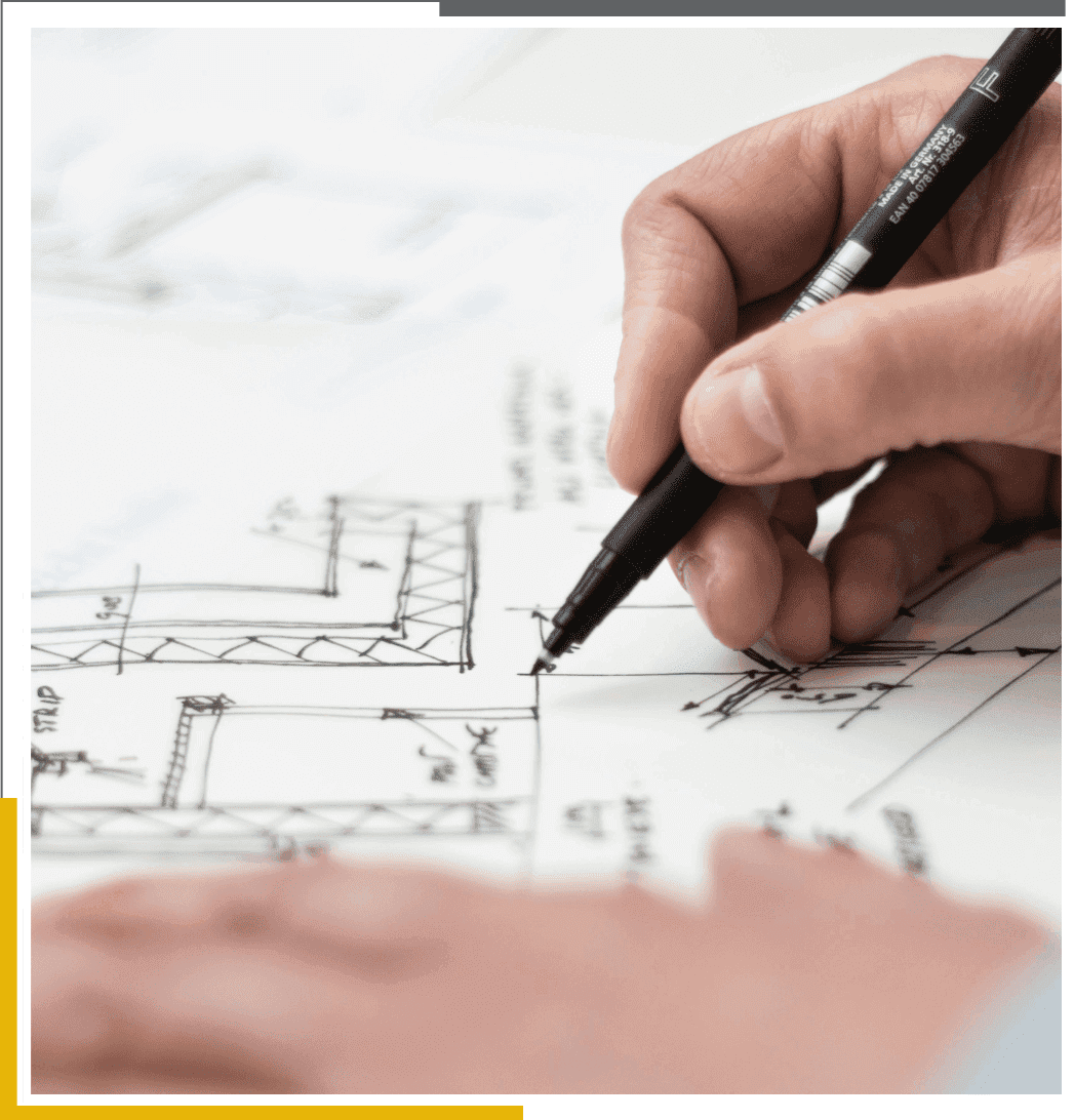 Hand drawing architectural plans with pen.